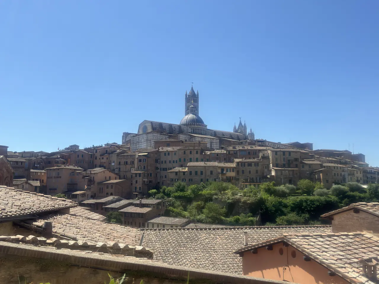 A wide view recorded near Siena skyline on July 1, 2025.