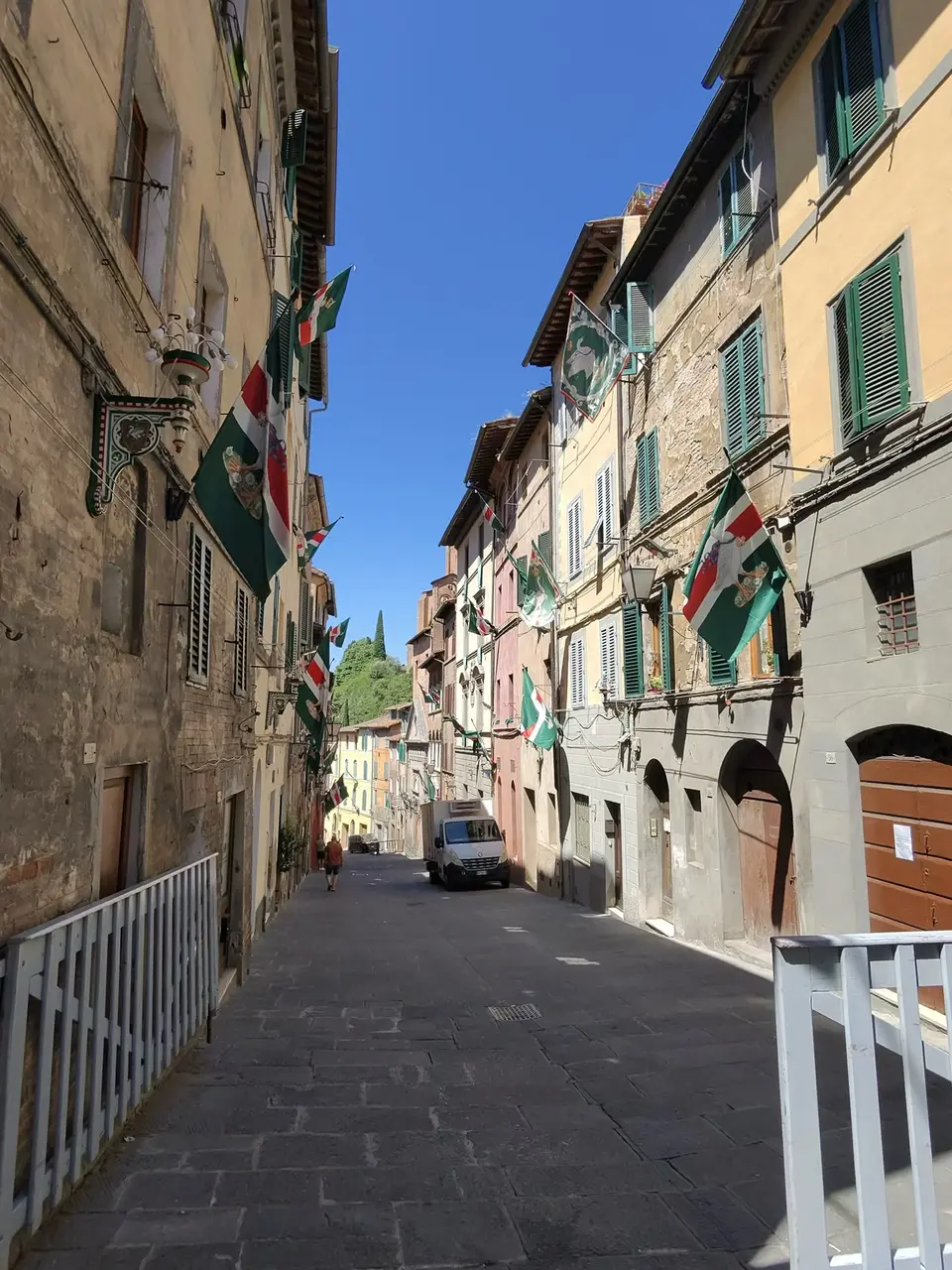 A vertical detail recorded near Siena’s medieval streets on July 1, 2025.
