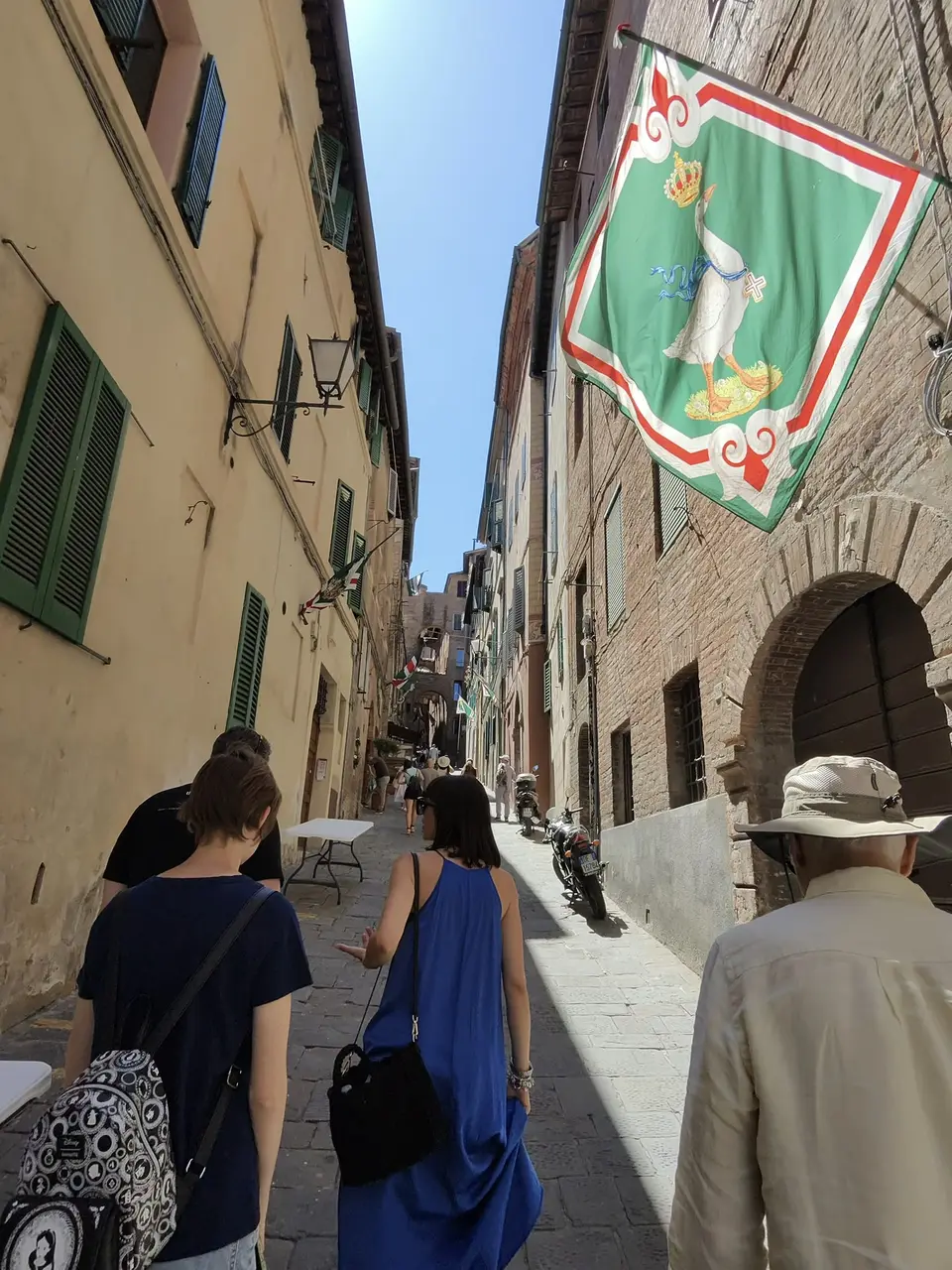 A vertical detail recorded near Siena’s medieval streets on July 1, 2025.