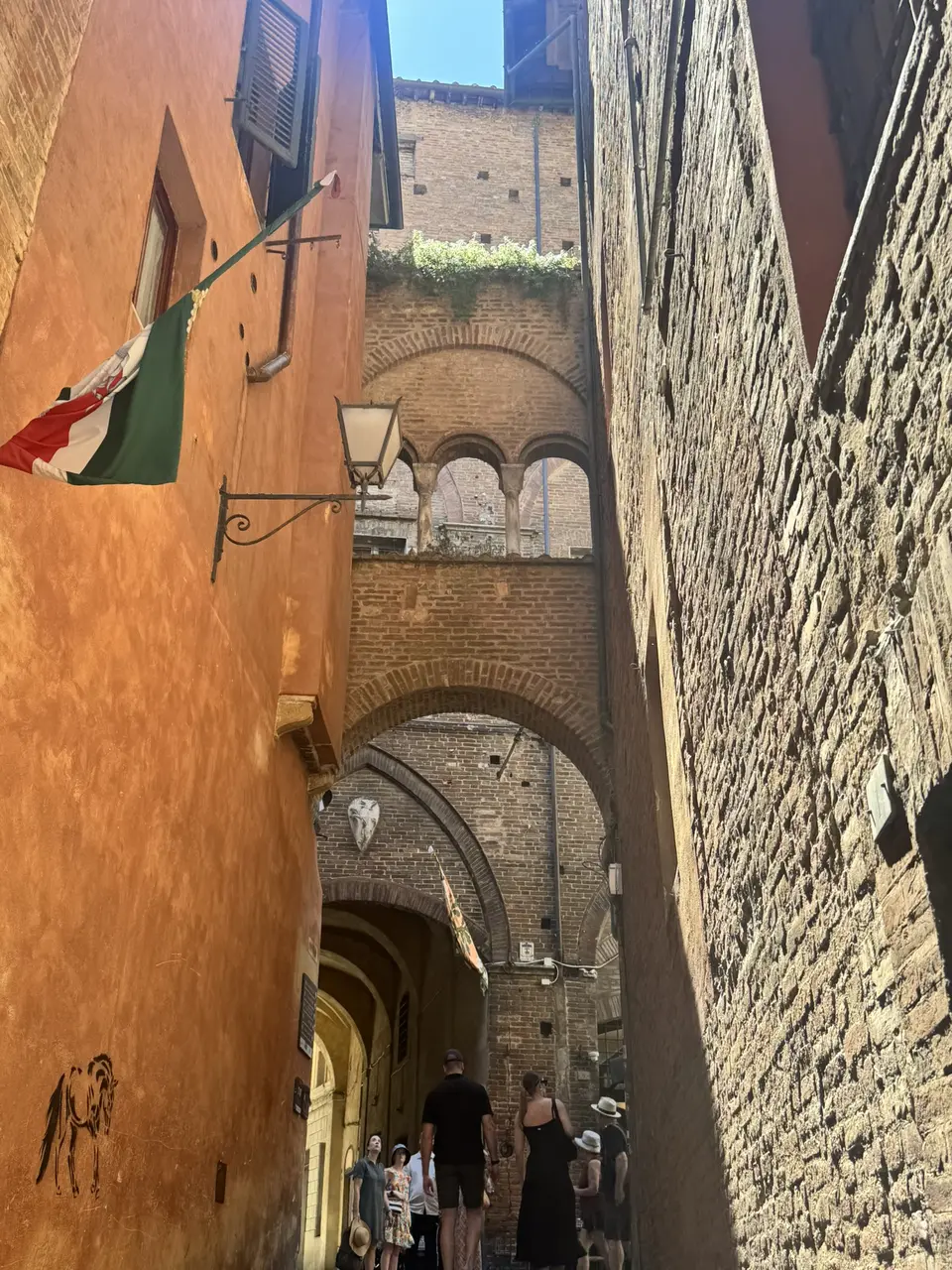 A vertical detail recorded near Siena’s contrade on July 1, 2025.