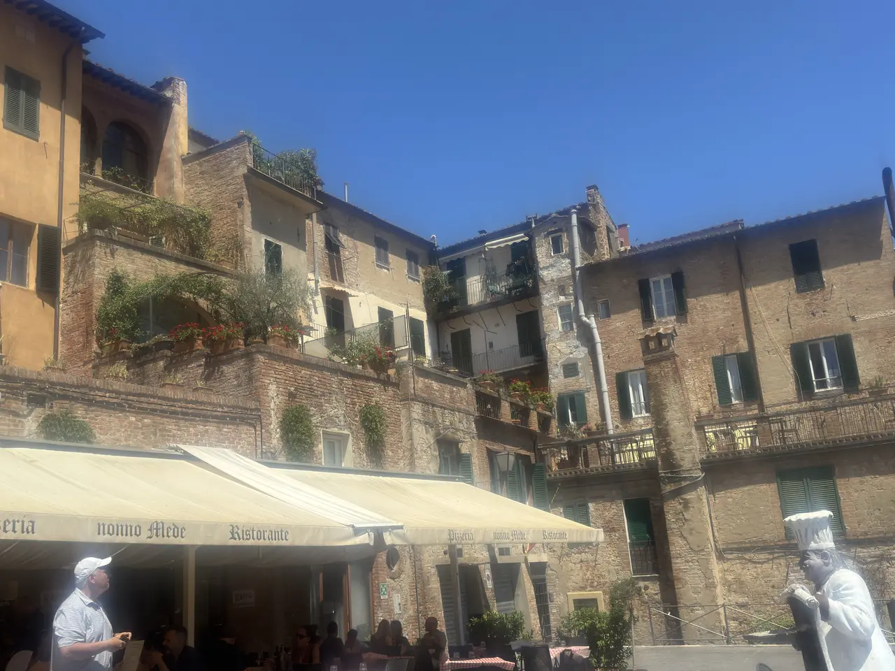 A wide view recorded near Siena’s medieval streets on July 1, 2025.