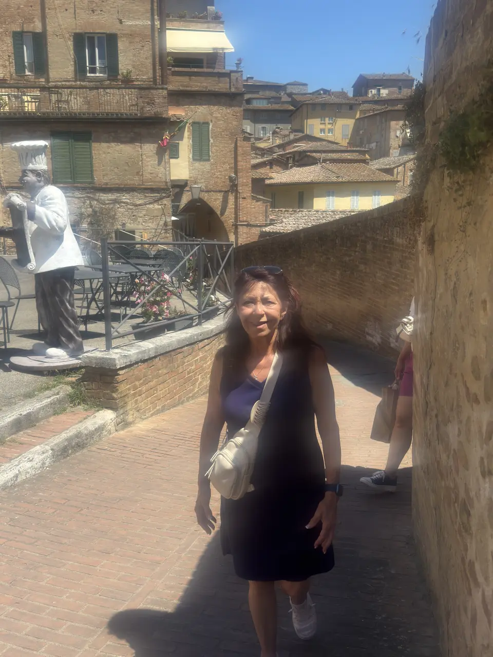 A vertical detail recorded near Siena’s medieval streets on July 1, 2025.