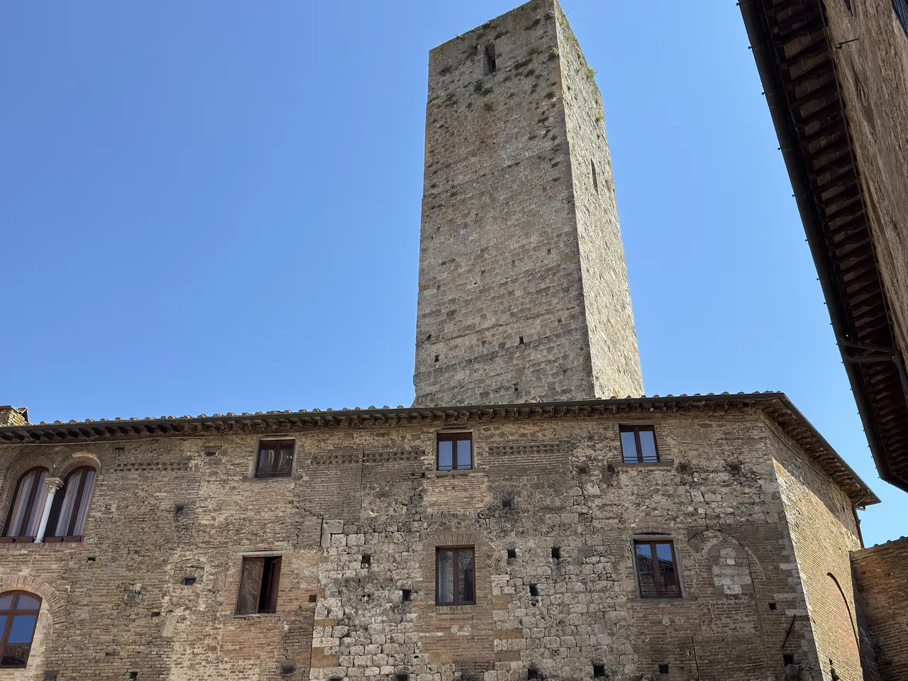 A wide view recorded near San Gimignano’s towers on July 1, 2025.